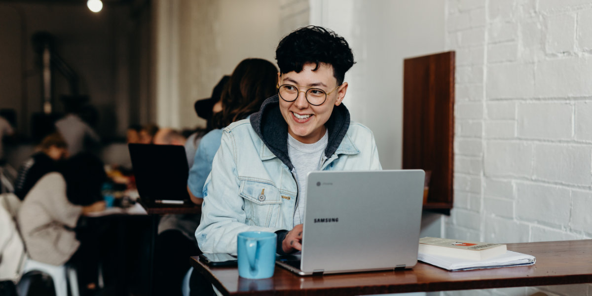 Trading smiling at computer